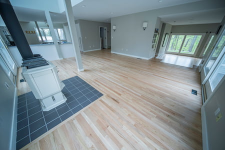 Mix hardwood and vinyl floors in the same property