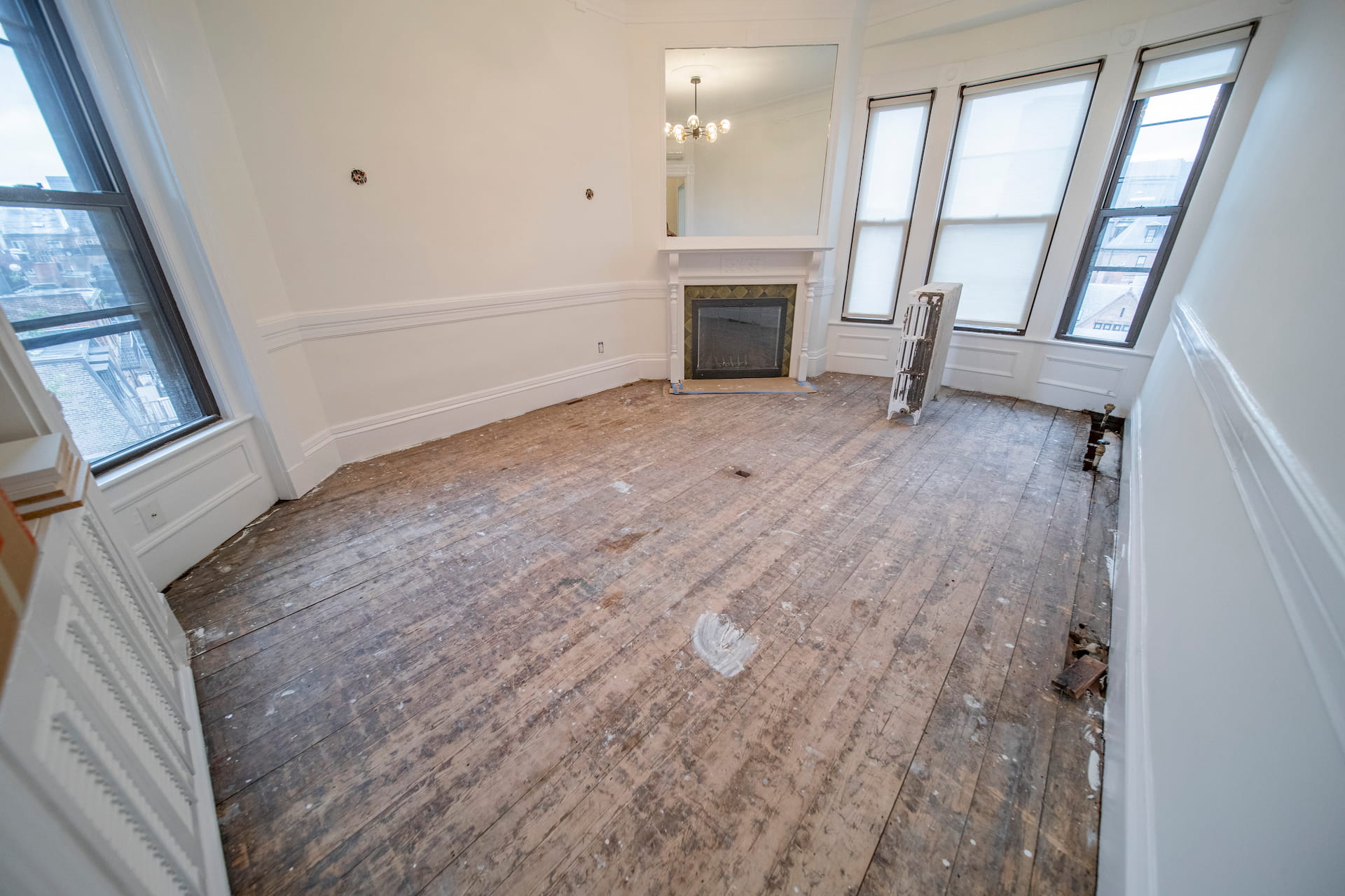 Hardwood floor before Weles repair and refinishing