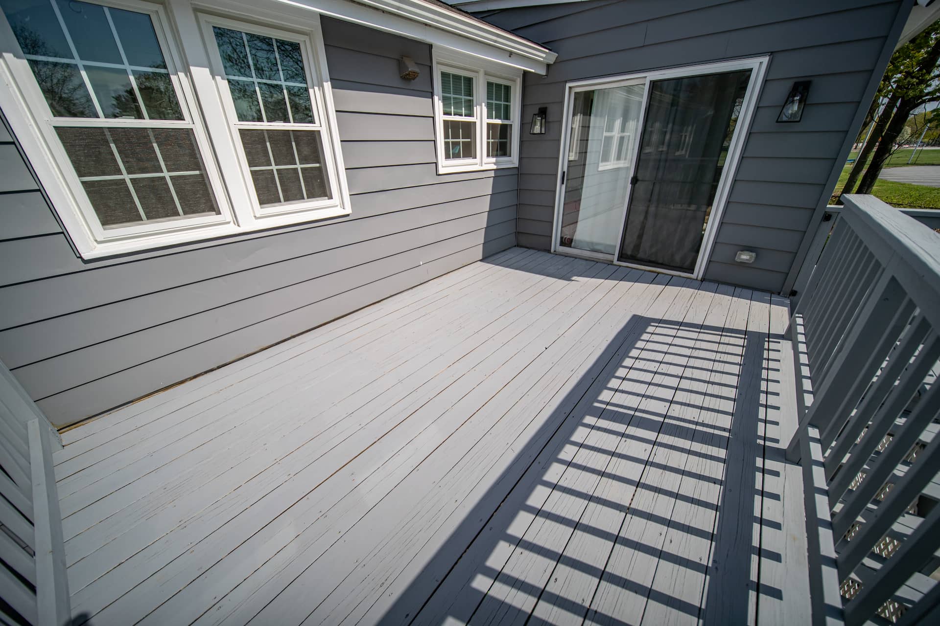 The same deck boards after sanding and refinishing by Weles