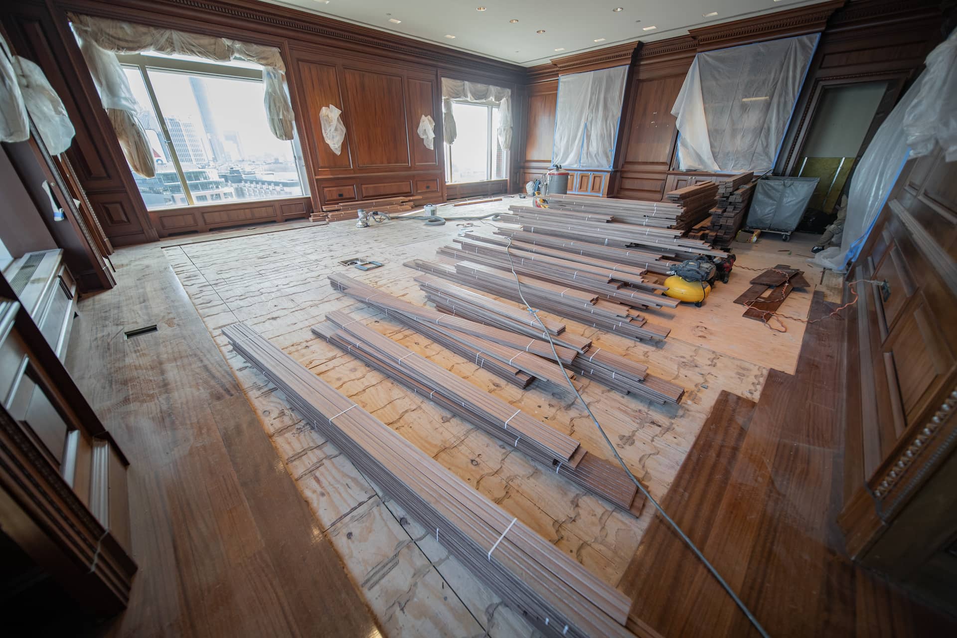 Close-up of restored hardwood boards after targeted repair and blending.