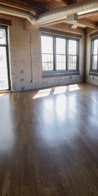 How much does it cost to strip and refinish hardwood floors?